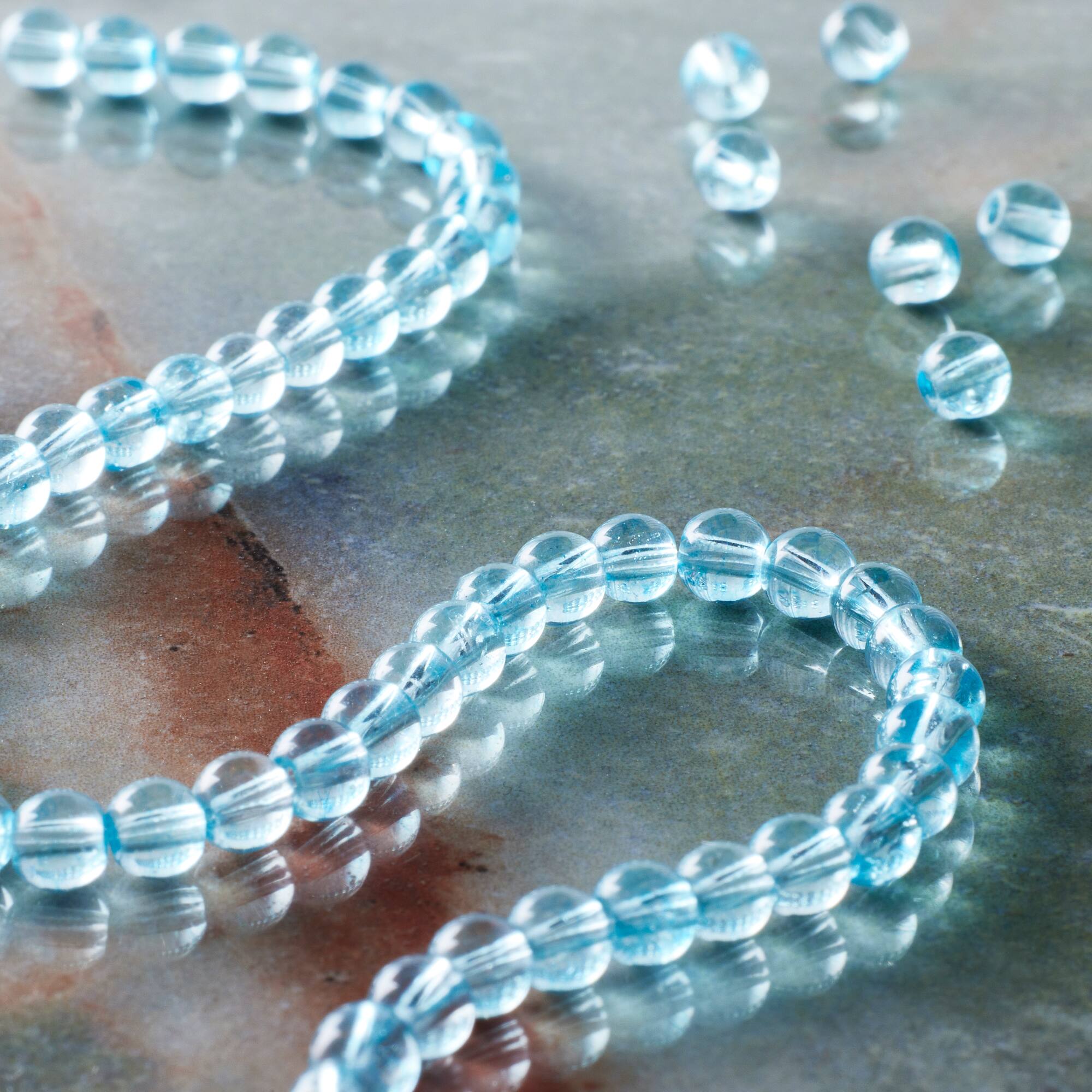 12 Pack: Light Blue Quartz Round Beads by Bead Landing